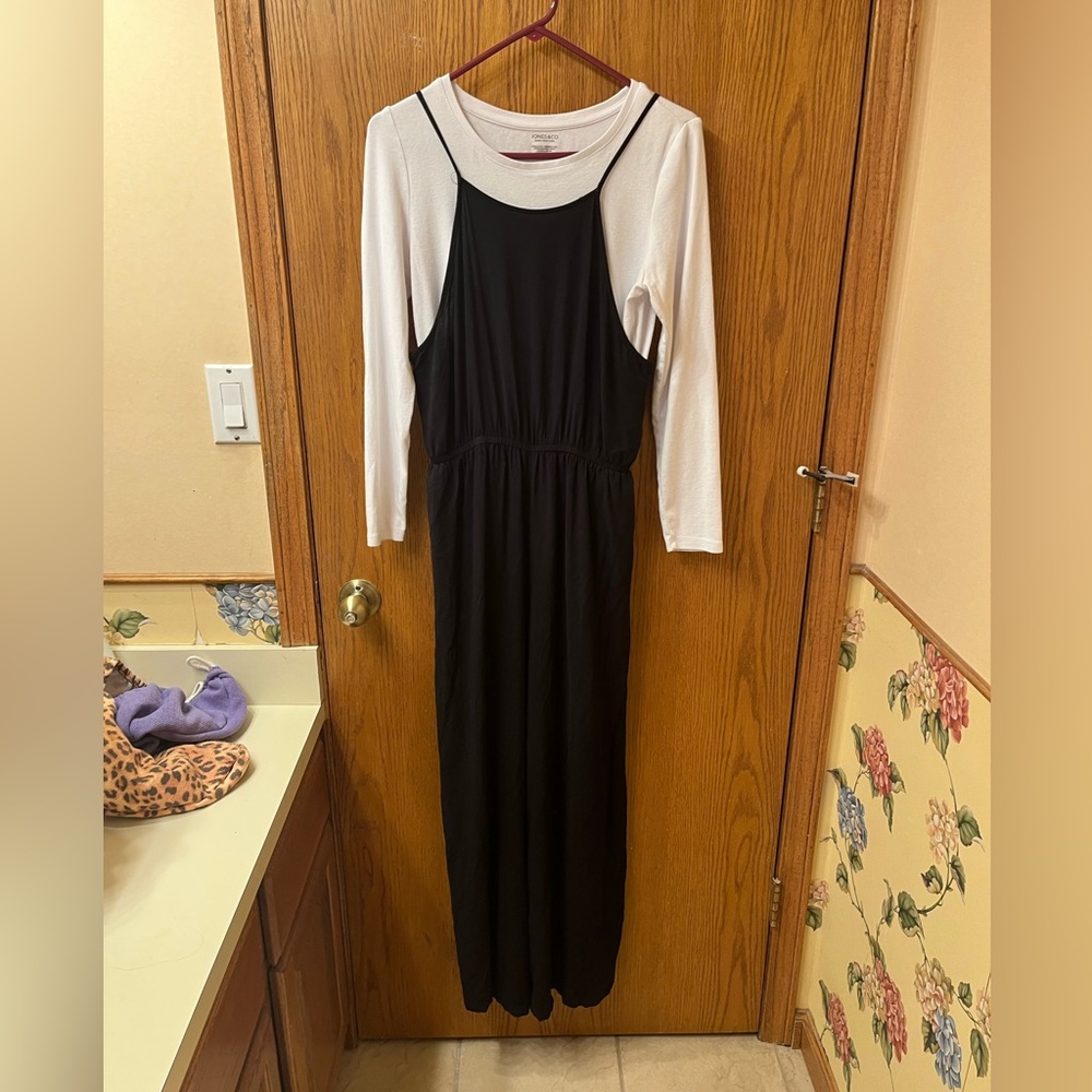 Justify size XL jumpsuit. Black with stretchy back and full legs.